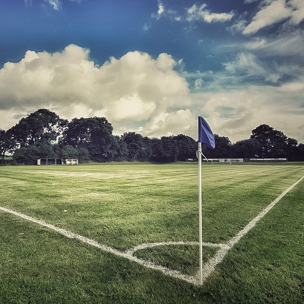 A football playing field on hard-wearing amenity lawn mix inside of a football pitch. Showcasing our amenity lawn seed, grass lawn seed, lawn grass seed, garden grass seed, seed mixtures, amenity grass, sport grass seed, grass seed on football pitch, football pitch grass, football grass.